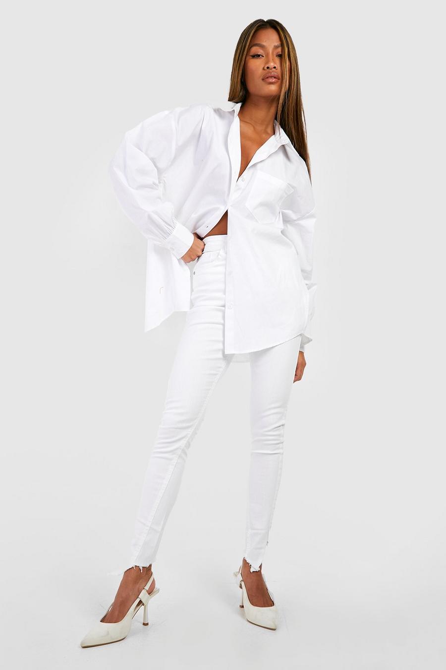 White Slitna skinny jeans med asymmetrisk kant image number 1