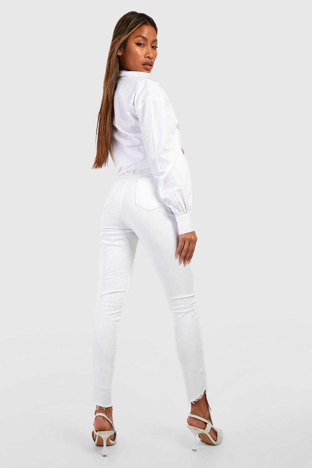 Distressed Asymmetric Hem Skinny Jeans boohoo FI