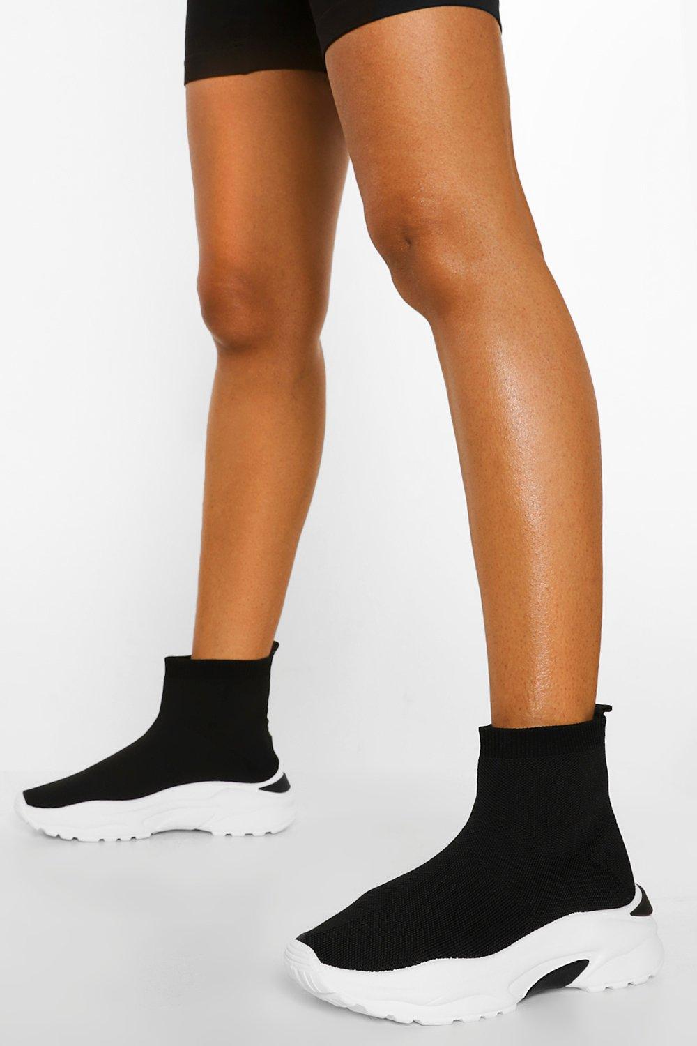 black sole sock trainers