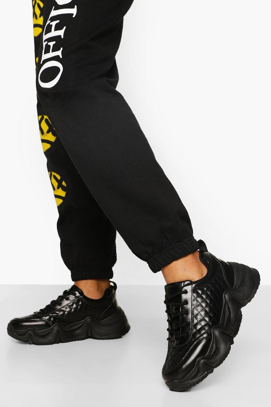 שחור נעלי ספורט עם סוליה עבה ודוגמת קווילט image number 1