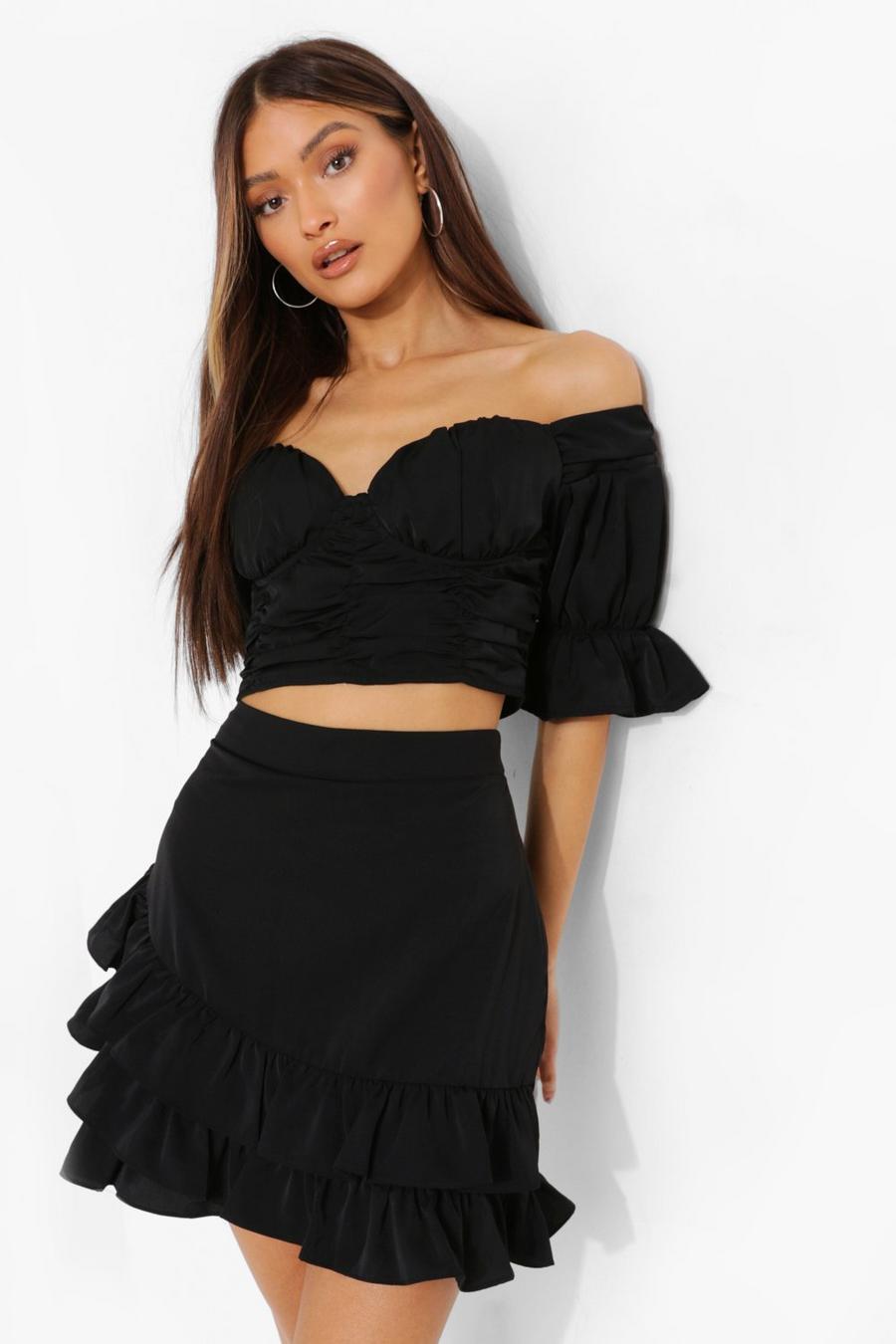 שחור חצאית מיני עם קפלים ומלמלה image number 1