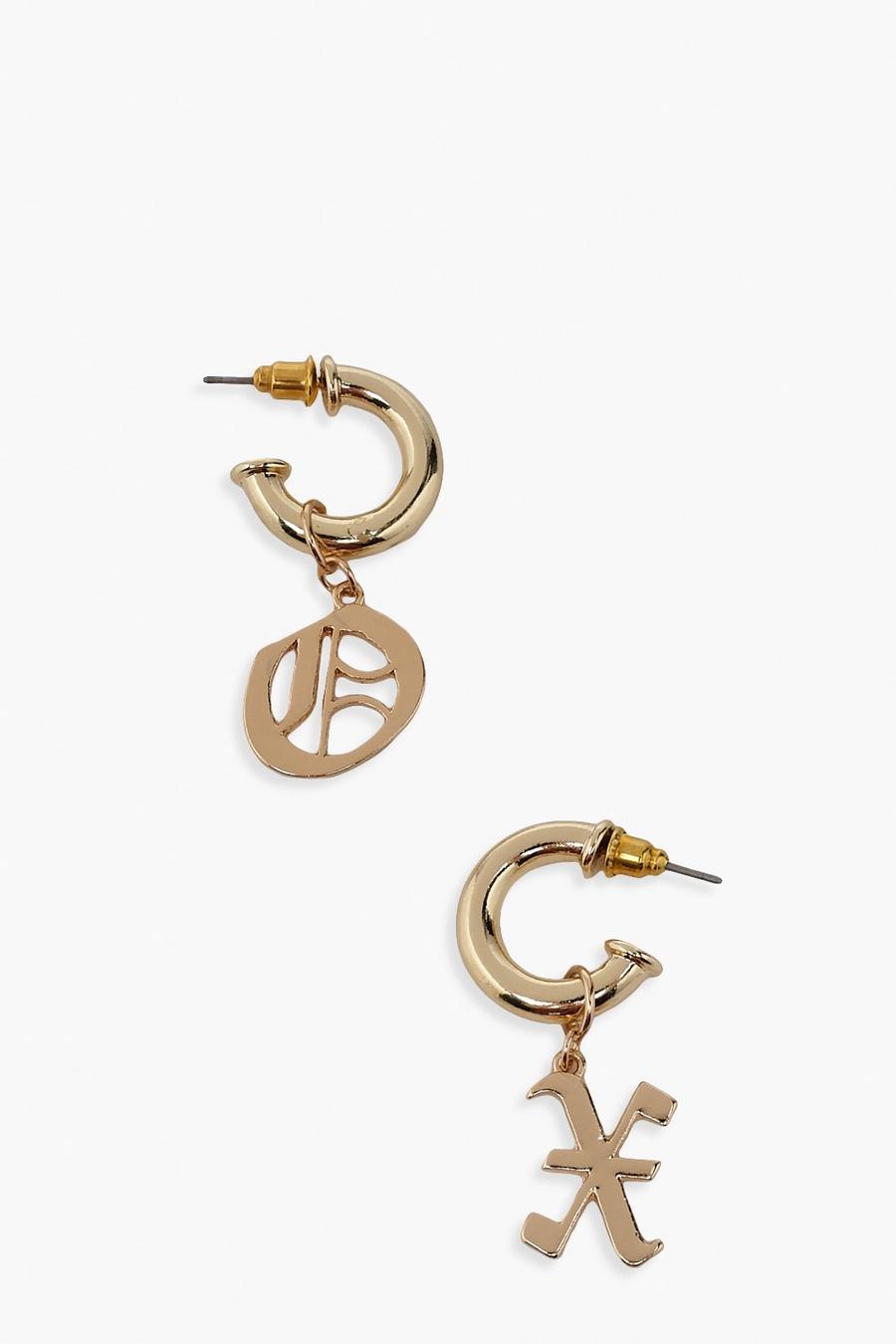 Gold metallic X O Charm Hoop Earrings image number 1
