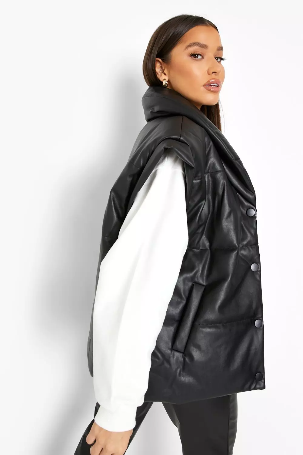 ASOS DESIGN faux leather puffer gilet in black