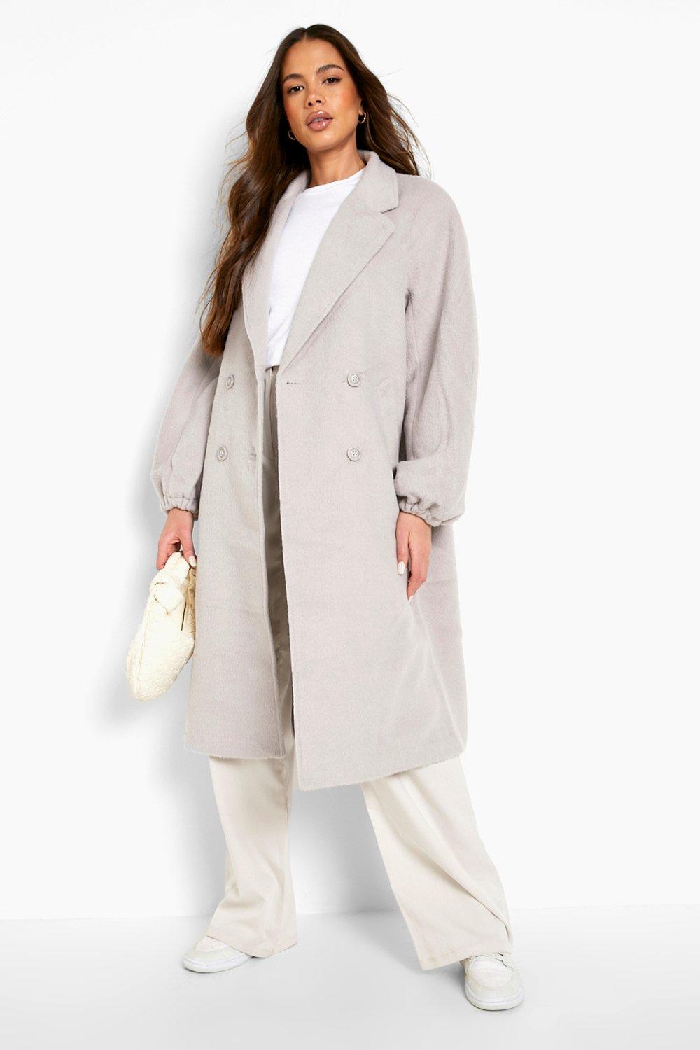 Manteau effet laine a manches bouffantes