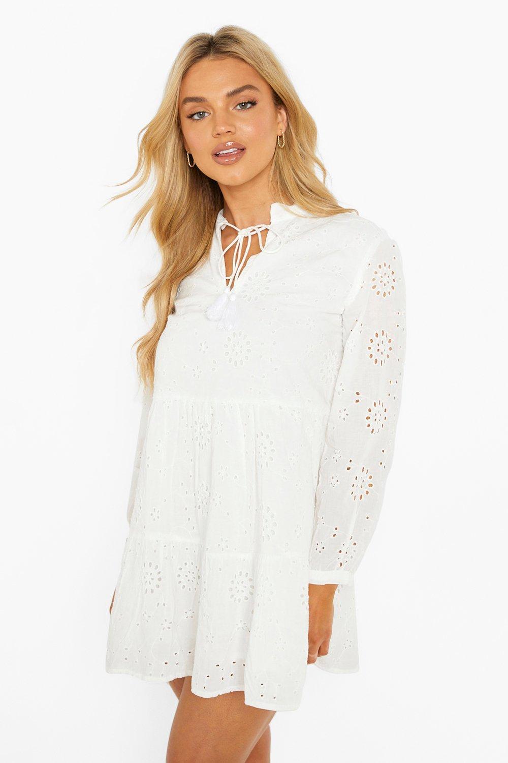 tiered trapeze mini dress in broderie