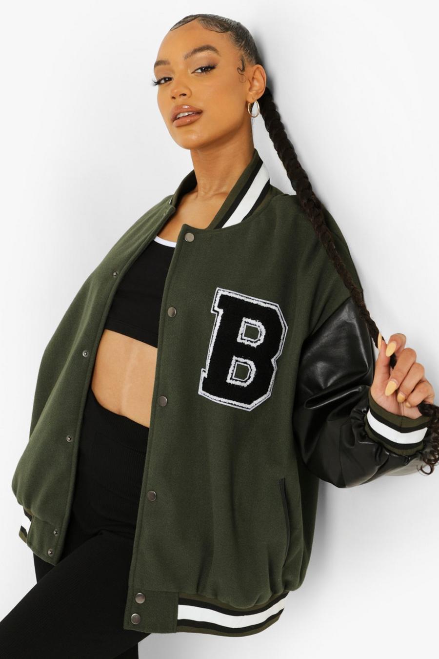 green varsity jacket look  Green varsity jacket, Casual winter outfits,  Baseball jacket outfit