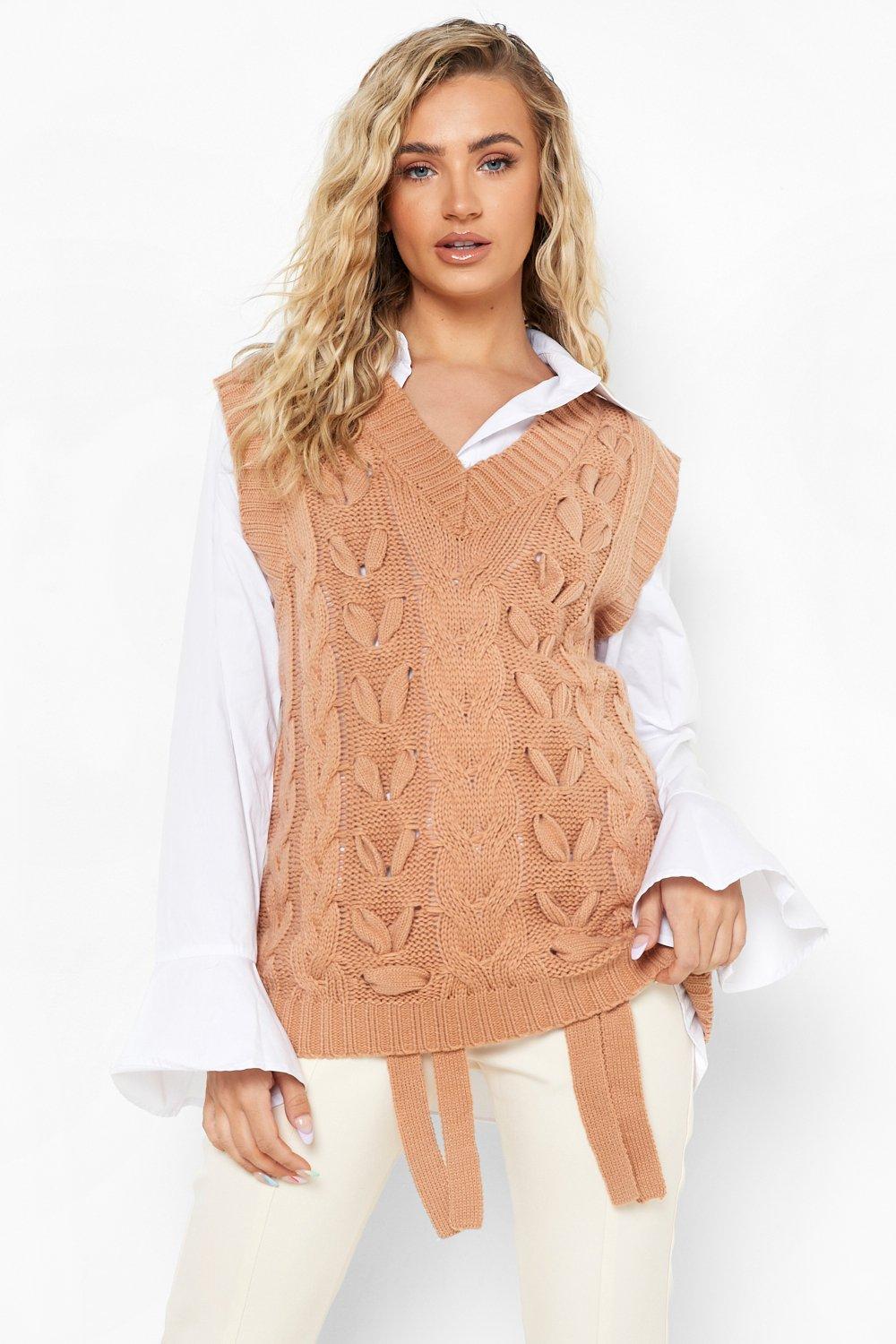 https://media.boohoo.com/i/boohoo/fzz24513_camel_xl_3/female-camel-chunky-lace-up-cable-knit-sweater-tank-top