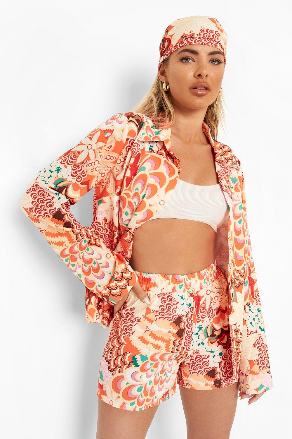 https://media.boohoo.com/i/boohoo/fzz25389_orange_xl_3/female-orange-three-piece-printed-shirt-&-shorts-set