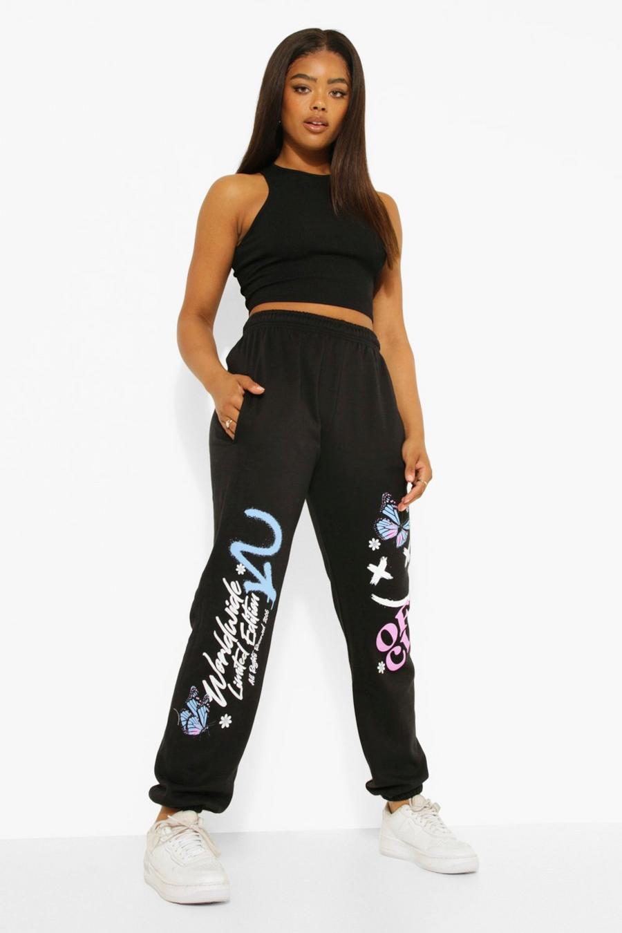 Pantalón deportivo con estampado de grafiti y mariposa, Black image number 1
