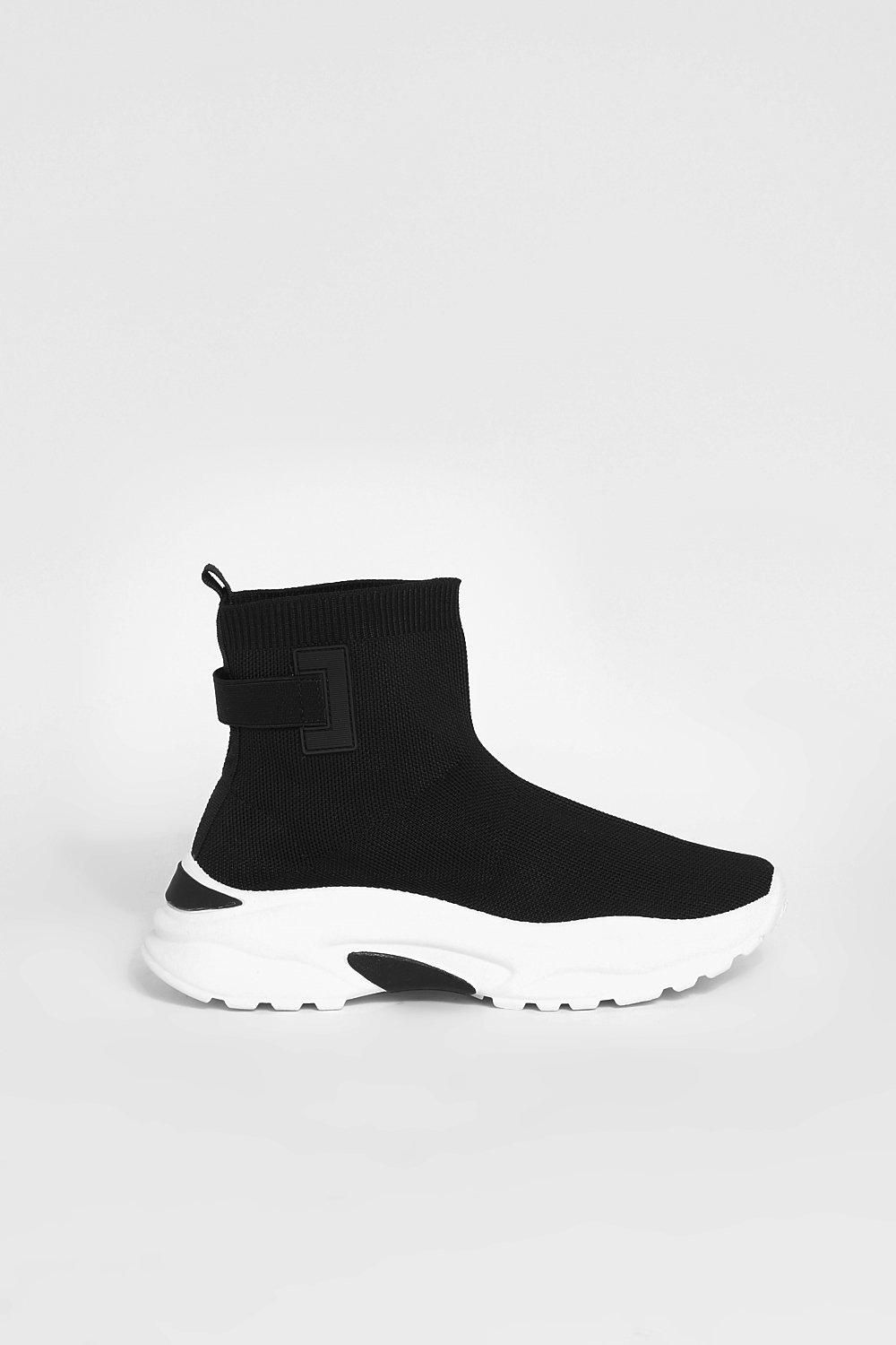 white trainers with black back