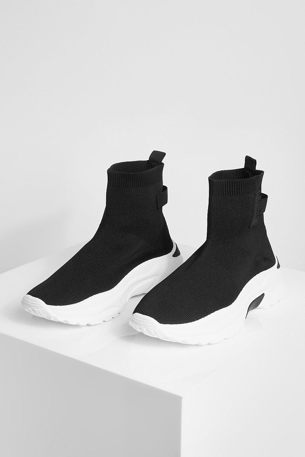 white trainers with black back