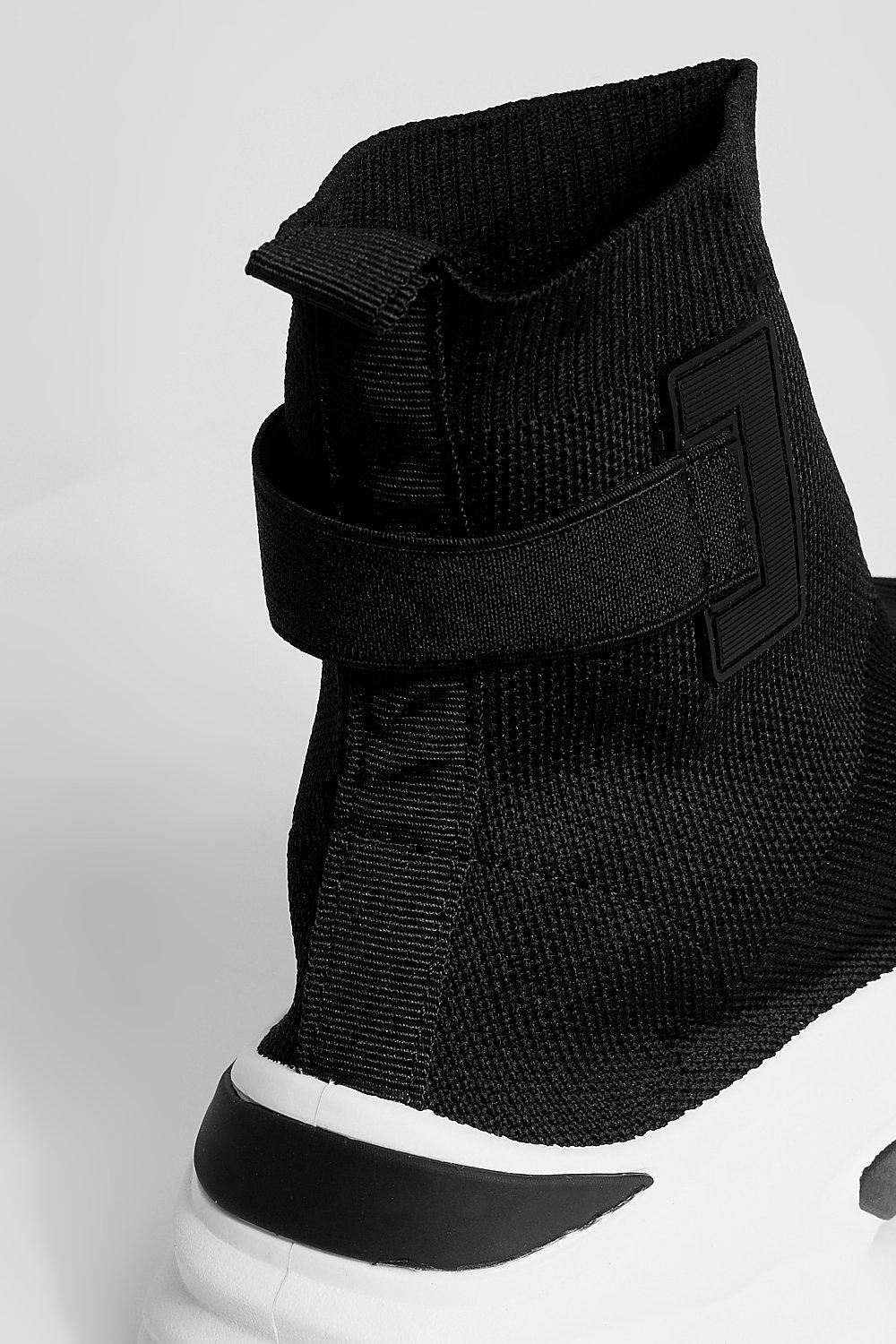 white trainers with black back