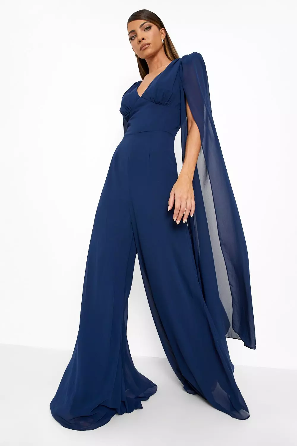 Plunge front store cape jumpsuit