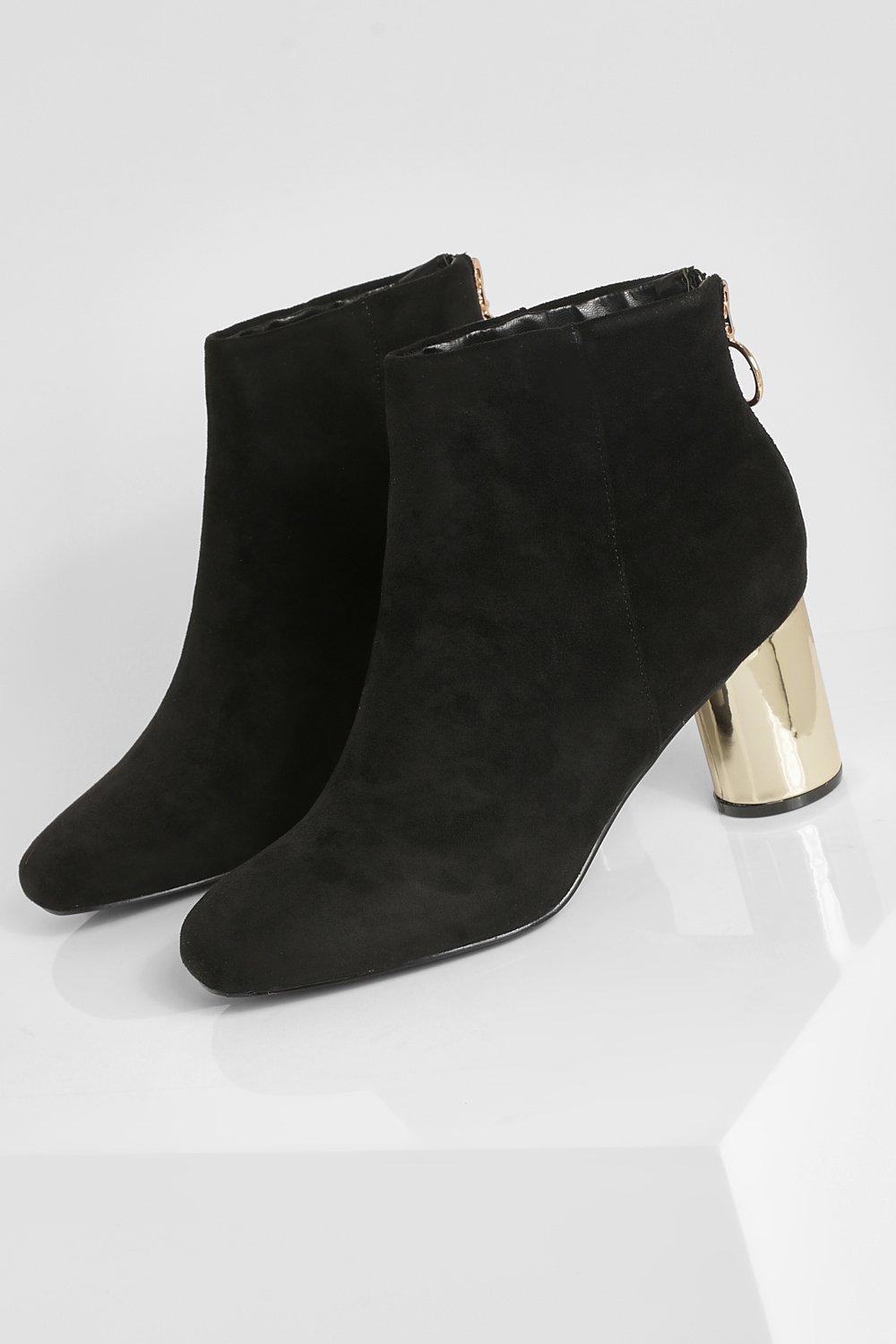 Black booties store with gold heel