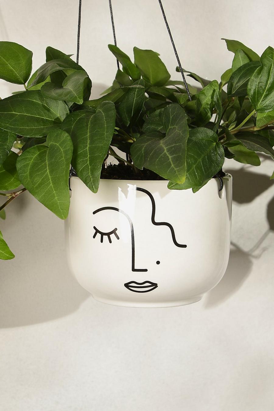 Hängender Pflanzentopf mit abstraktem Gesicht, White image number 1