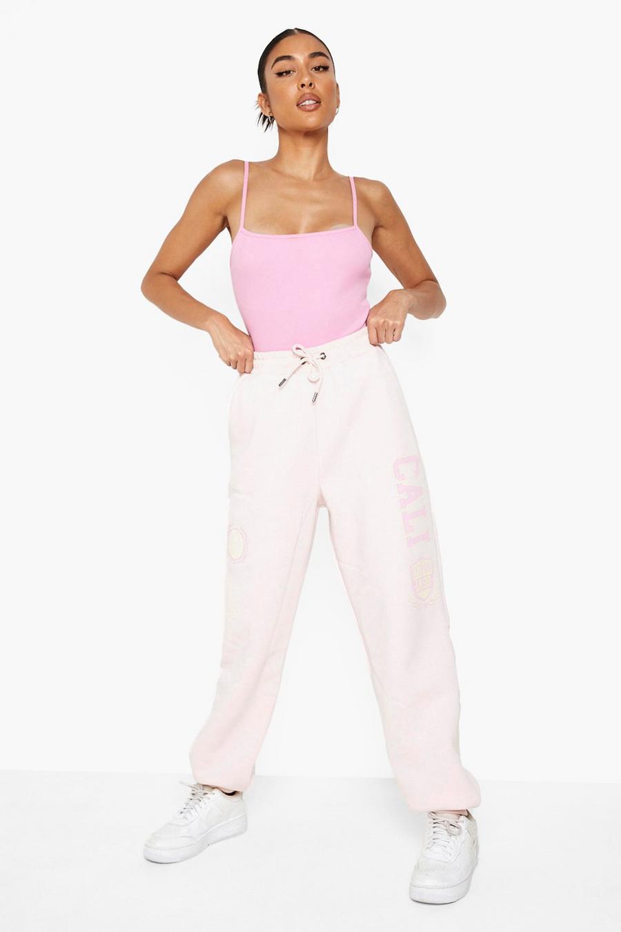 Pink Multi Graphic Wyoming Varsity Joggers image number 1