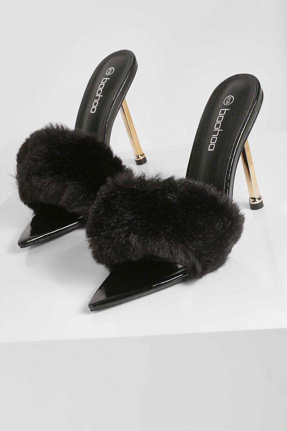 Black heels with store fur on toe