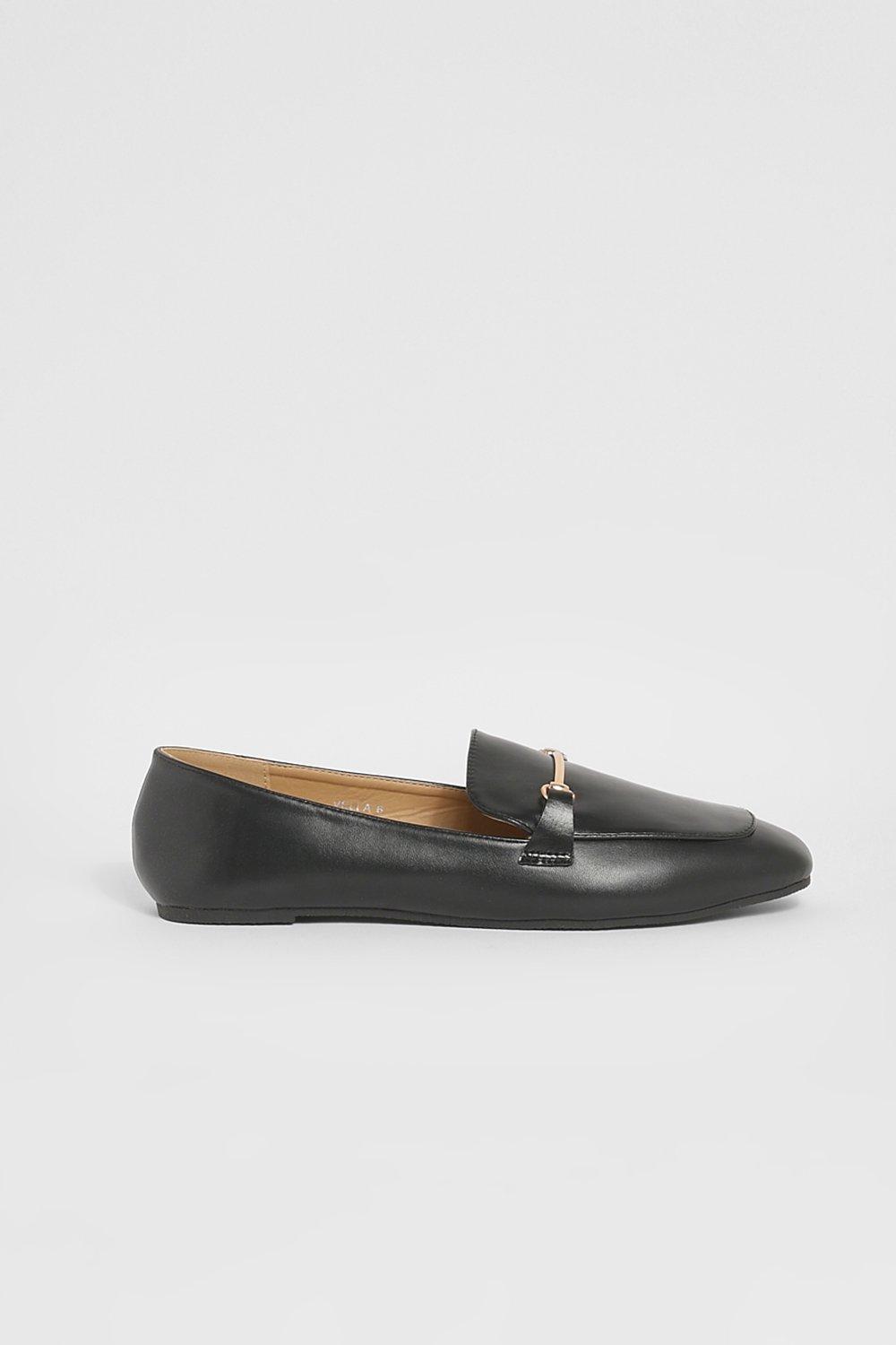 black loafers with gold detail