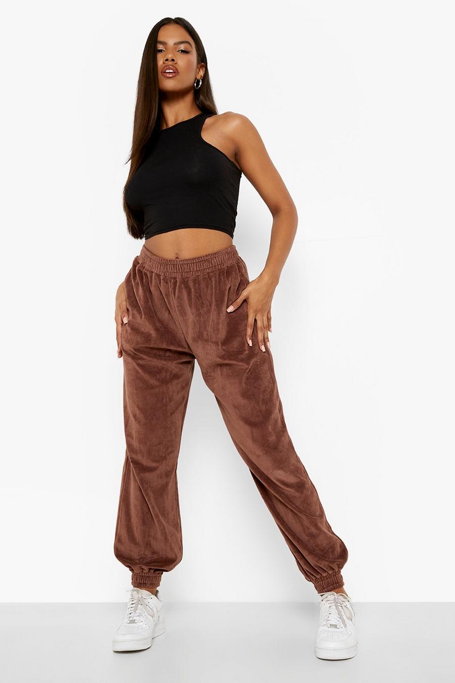 Pantaloni tuta Regular Fit in velours, Chocolate image number 1