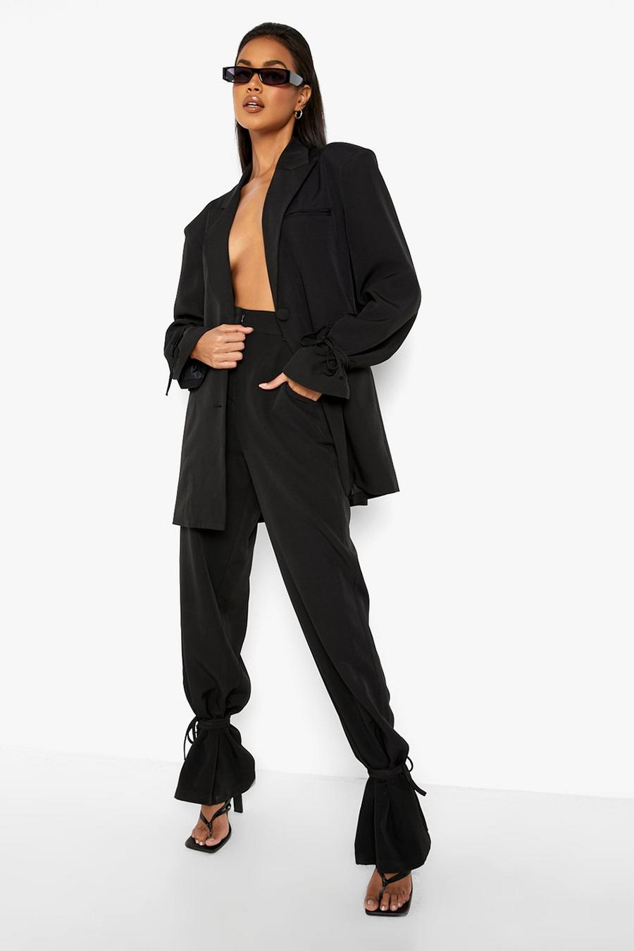 Black Kostymbyxor med ledig passform och knytdetaljer image number 1