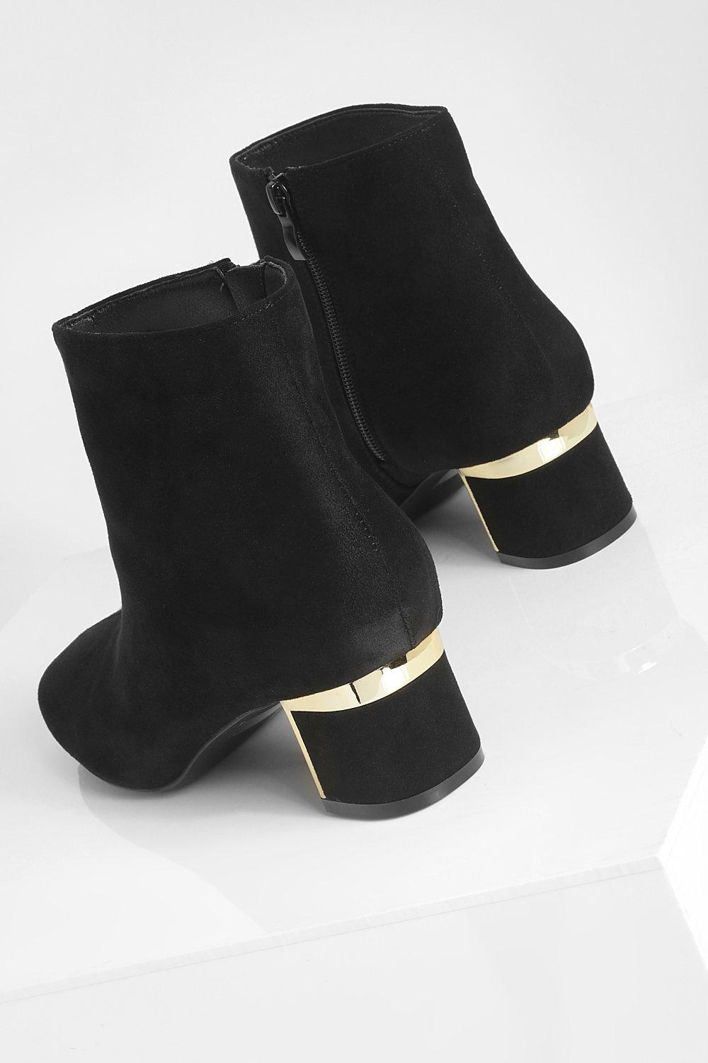 Metal heel outlet ankle boots