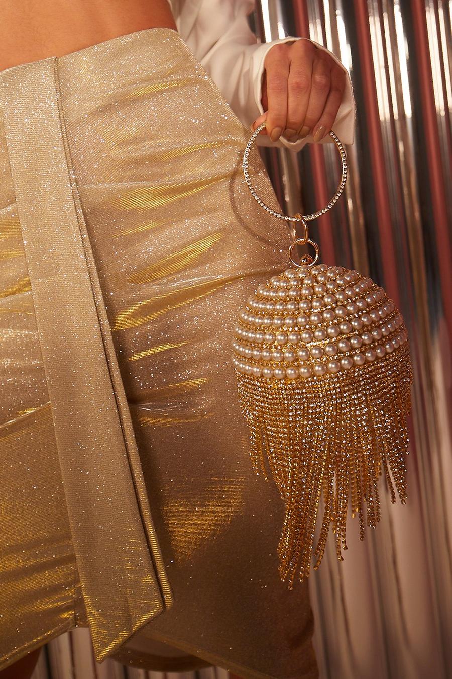 זהב metallizzato קלאץ' בצורת כדור עם יהלומים ופרנזים  image number 1