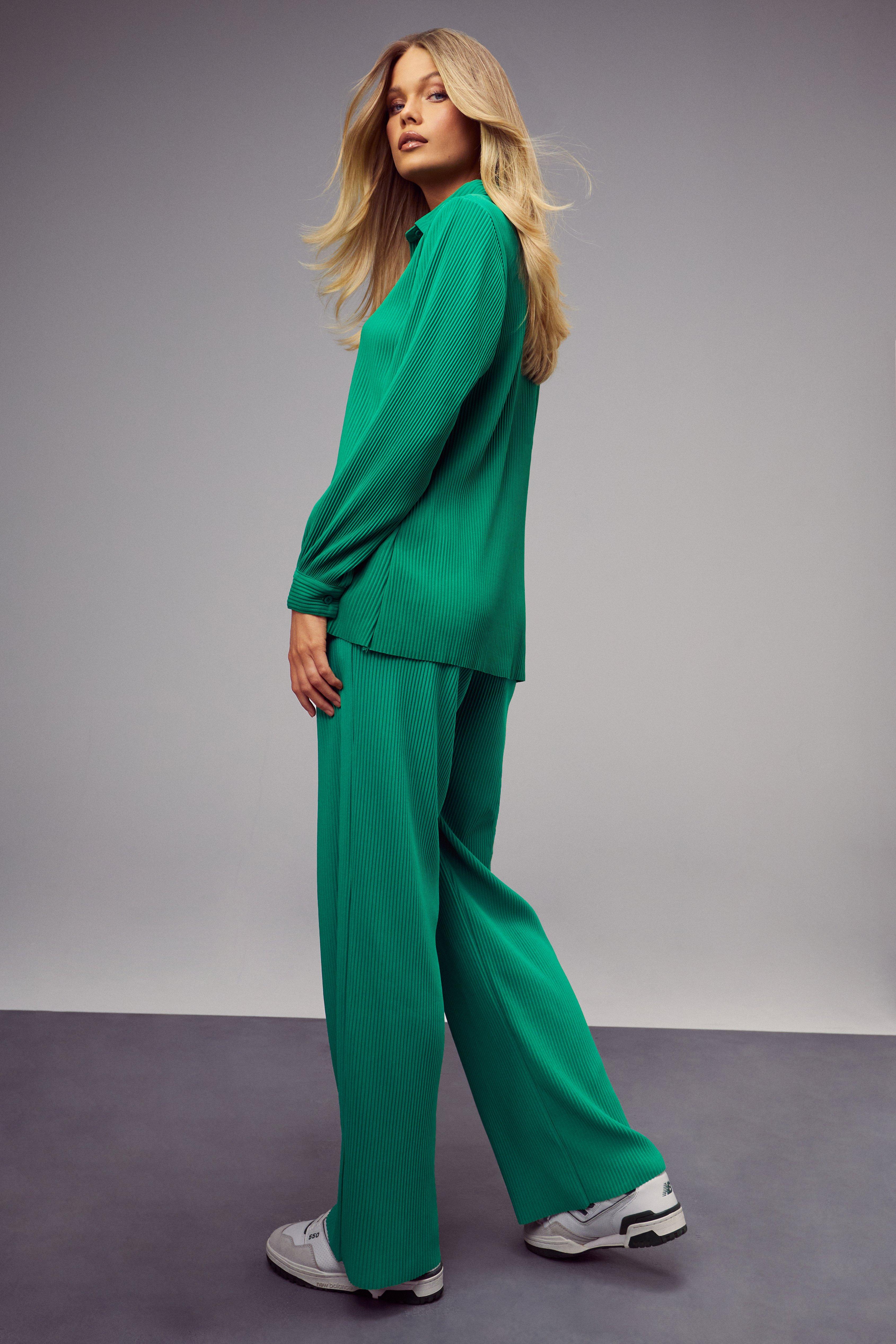 Green wide leg pants  Available on Equilibrio