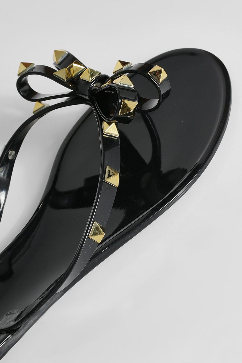 Metallic studded bow jelly sales flip flops