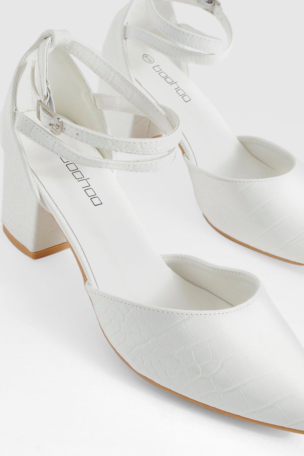 White low clearance block heel pumps