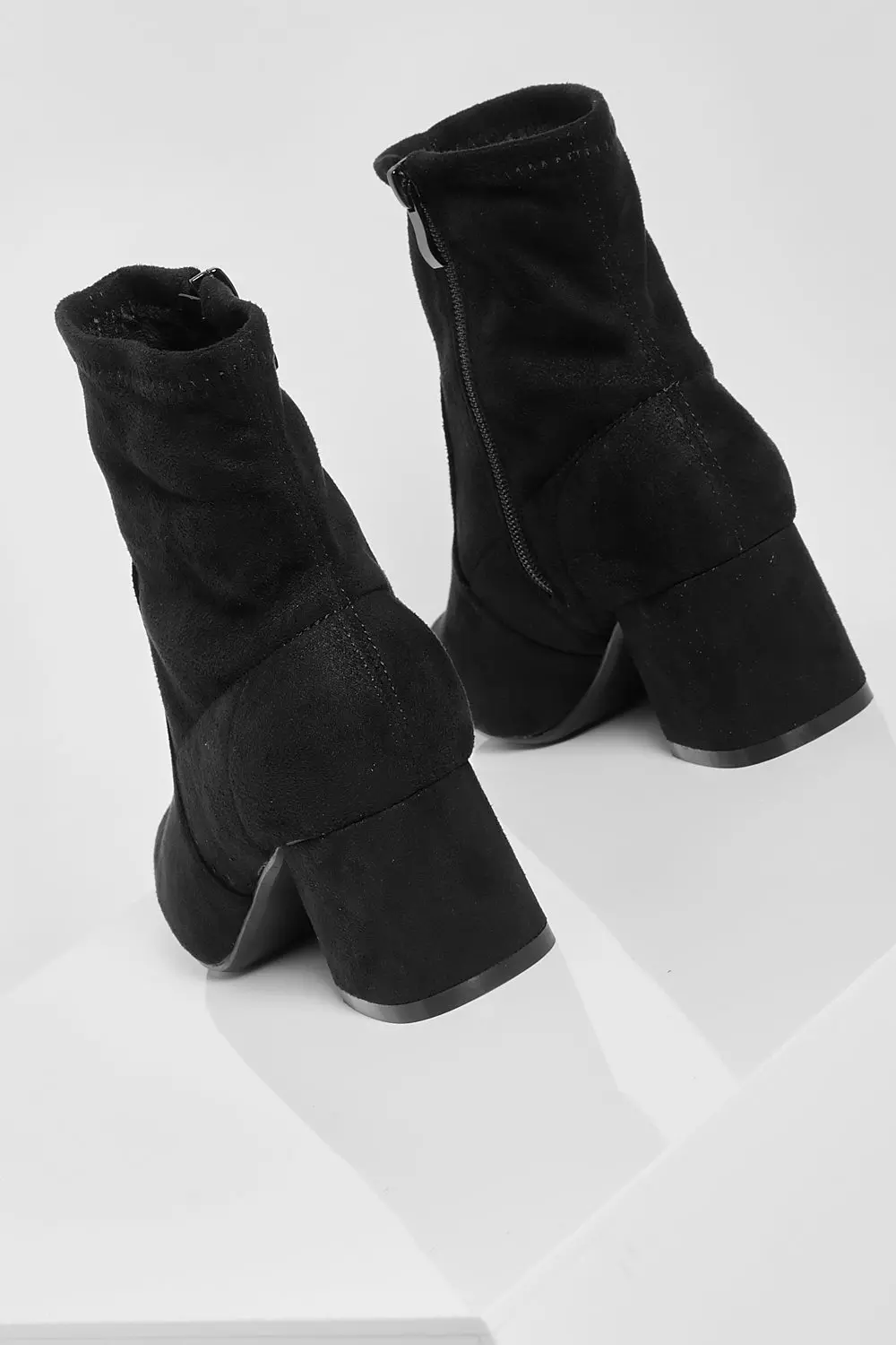 Sock boots store low block heel