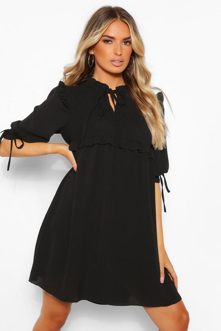 Black Långärmad klänning i vävt tyg med smock image number 1
