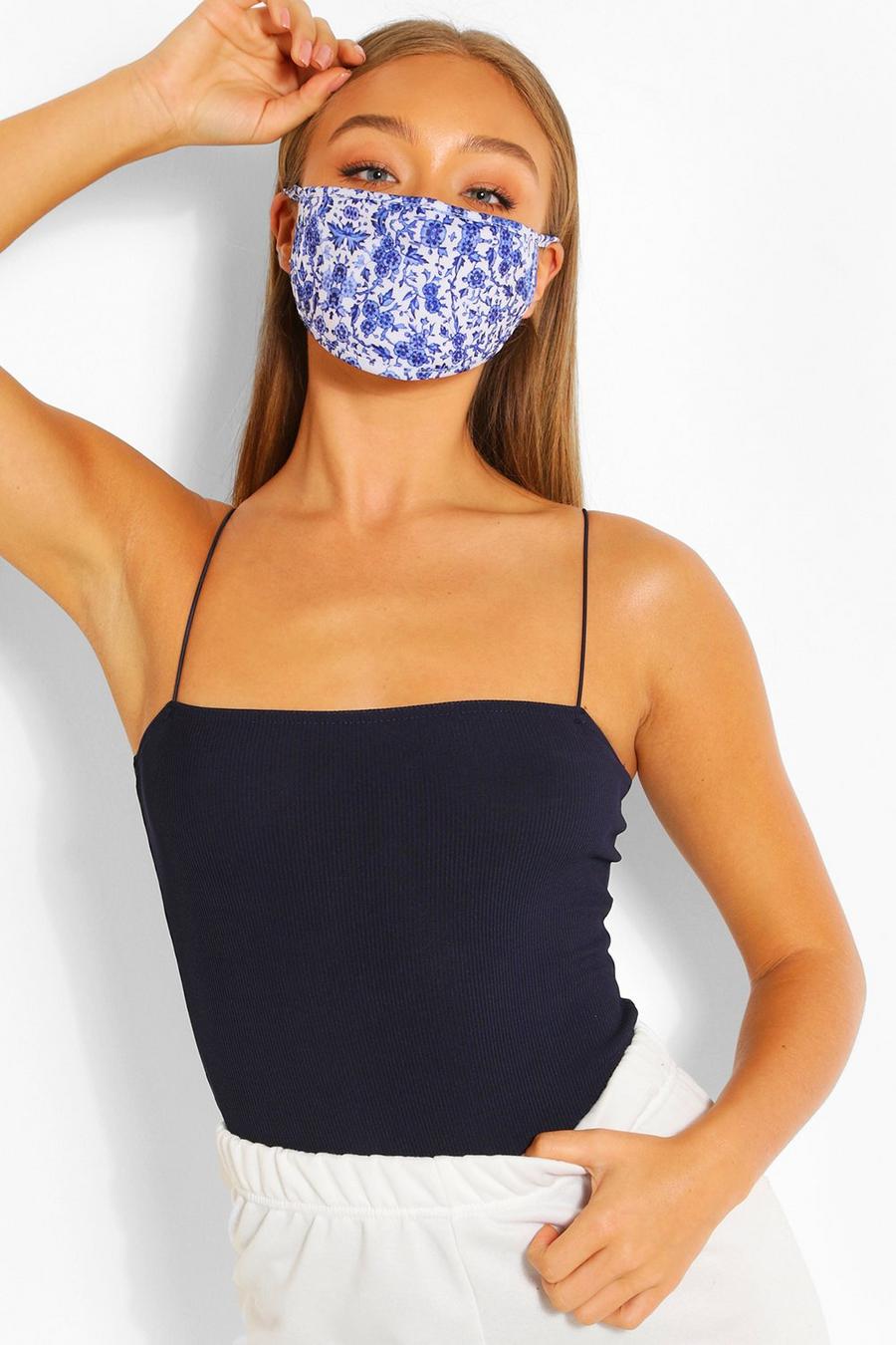 Fashion-Gesichtsmaske mit Streublütenprint , Blau image number 1