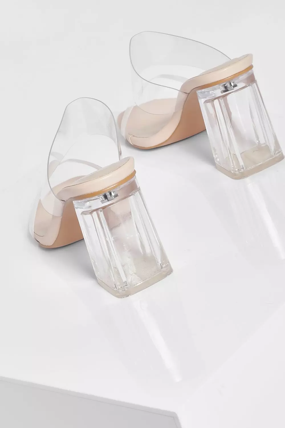 Clear store plastic mules