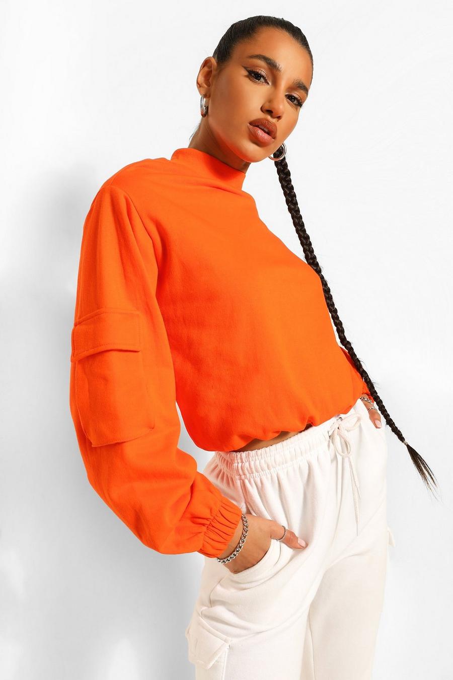Orange Kort sweatshirt med hög krage och utilityfickor image number 1