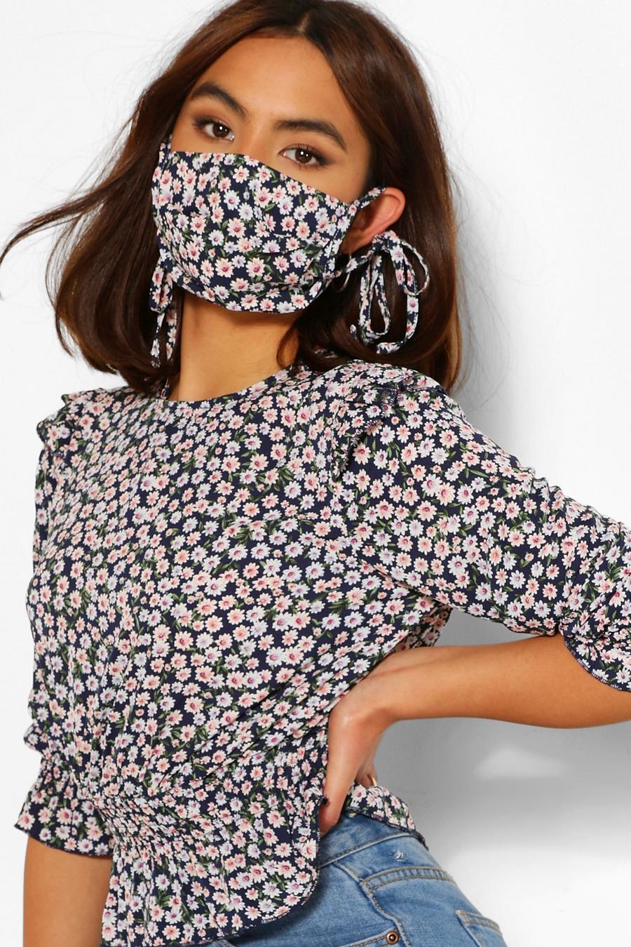 Mascherina alla moda con stampa a fiorellini image number 1