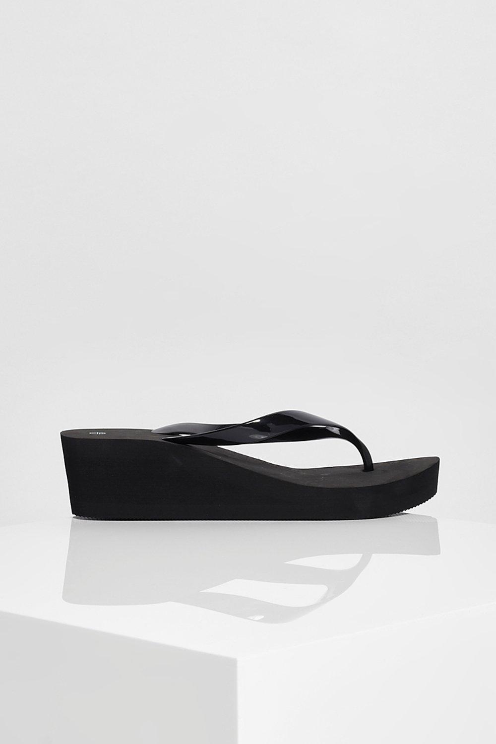 Black wedge flip store flops uk