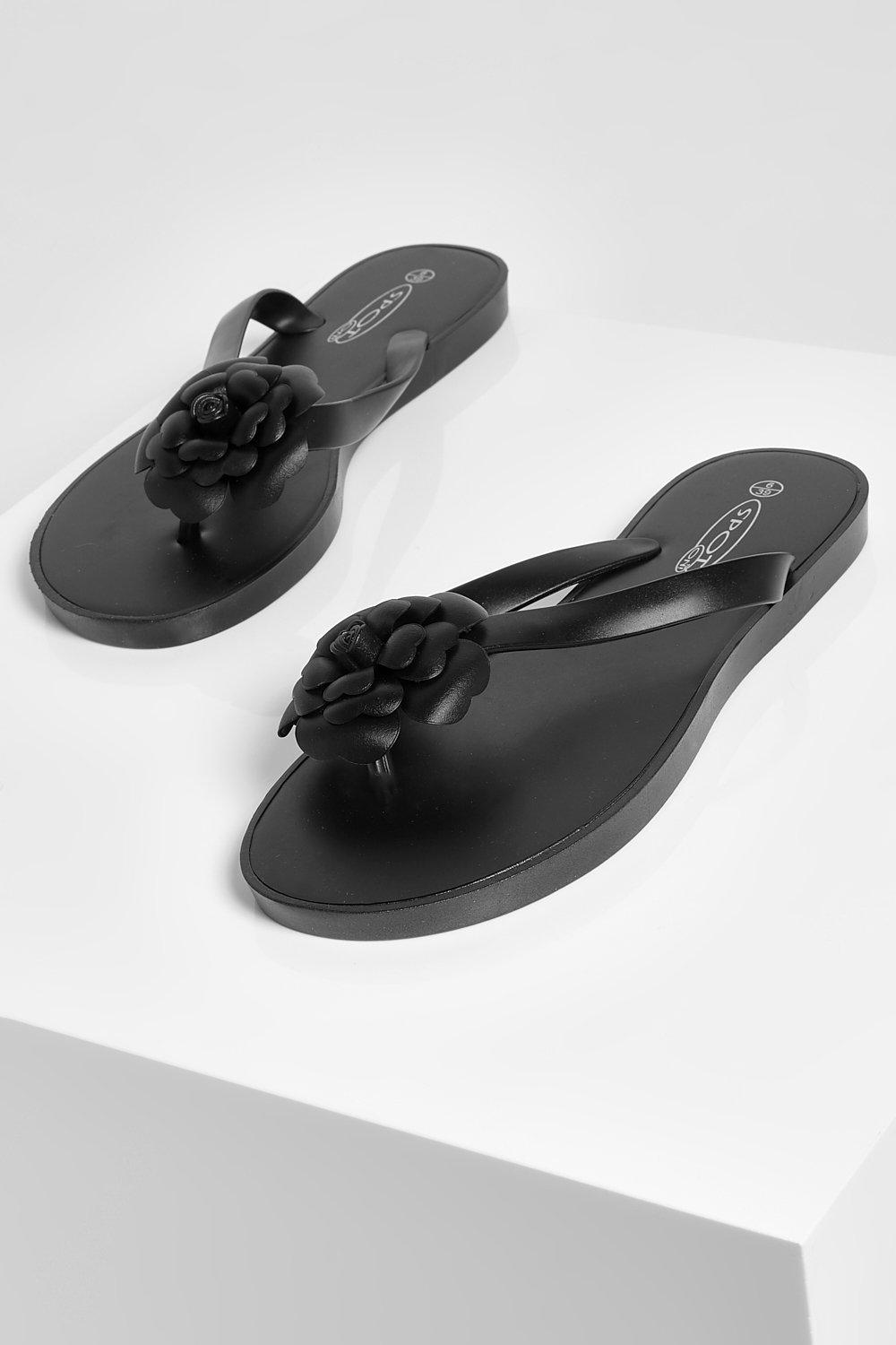 Black flower cheap flip flops