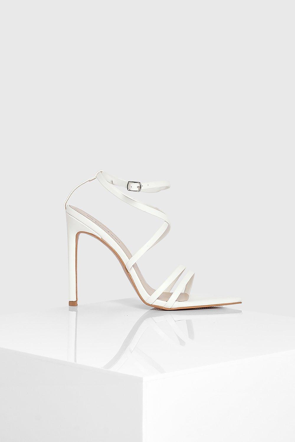 White pointed strappy store heels