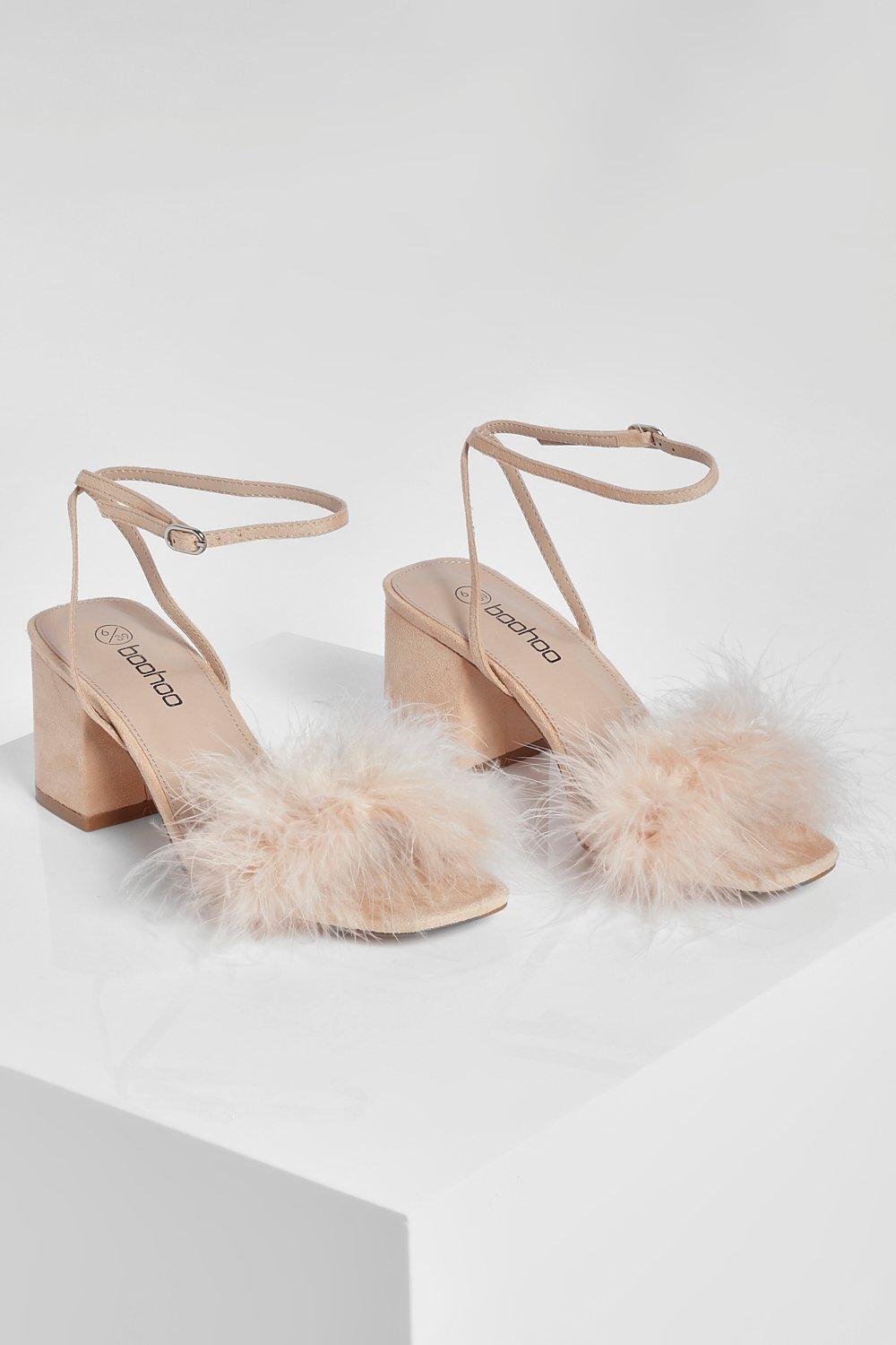 Pink fluffy block store heels