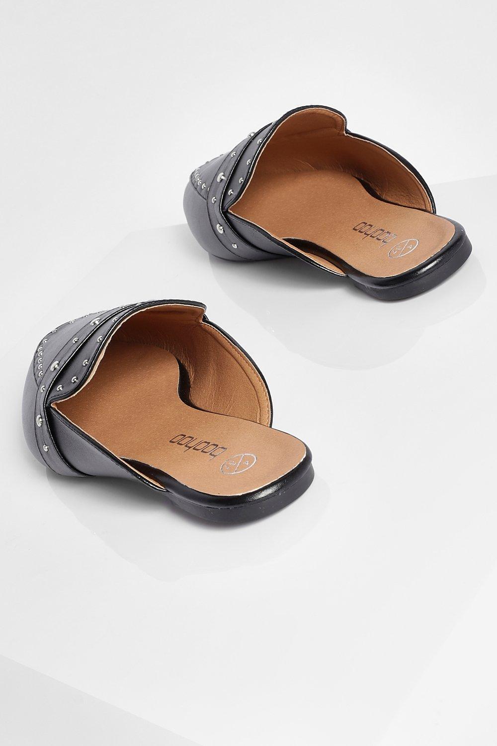 mules noires cloutées