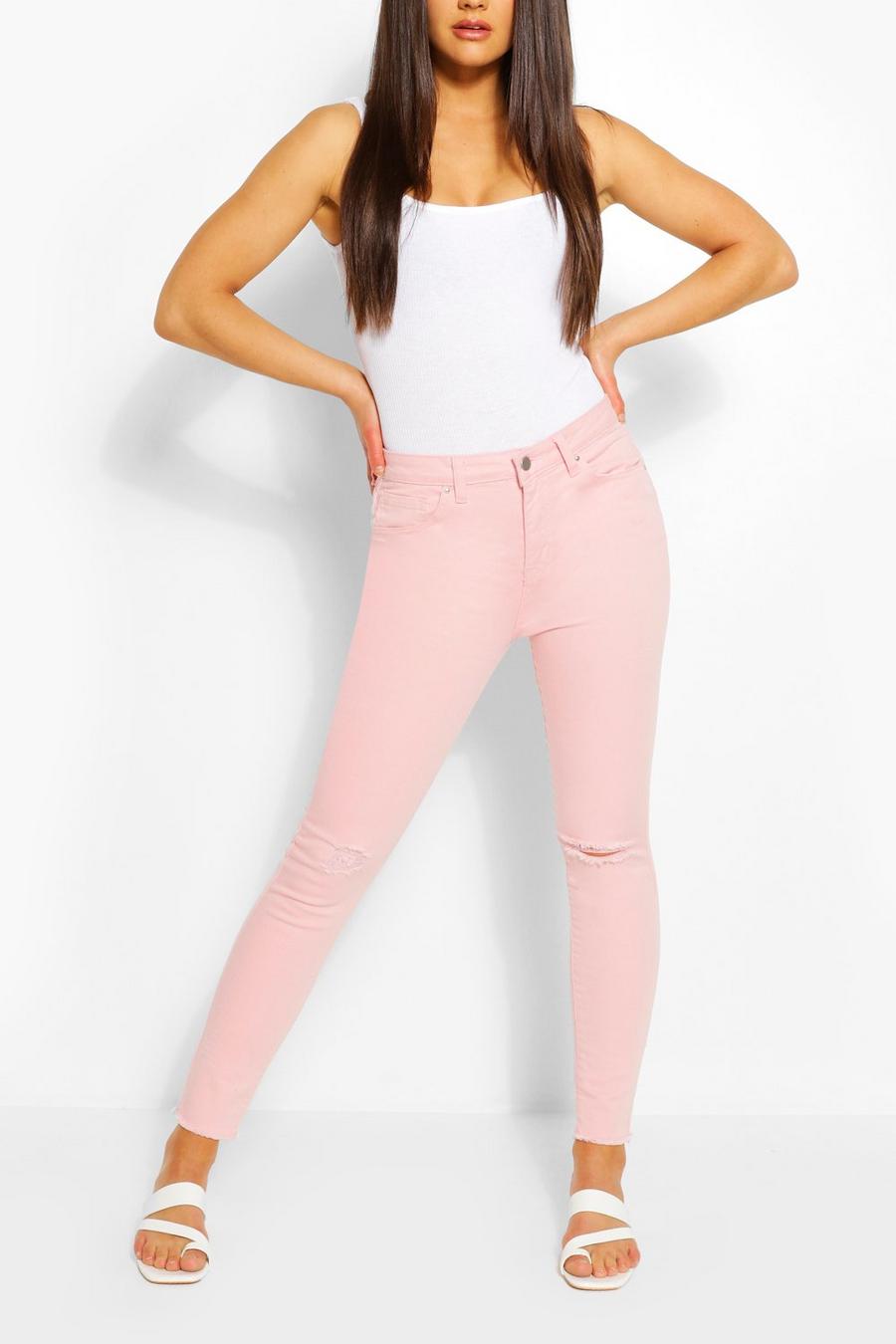 Rosa skinny jeans med slitage och stretch image number 1