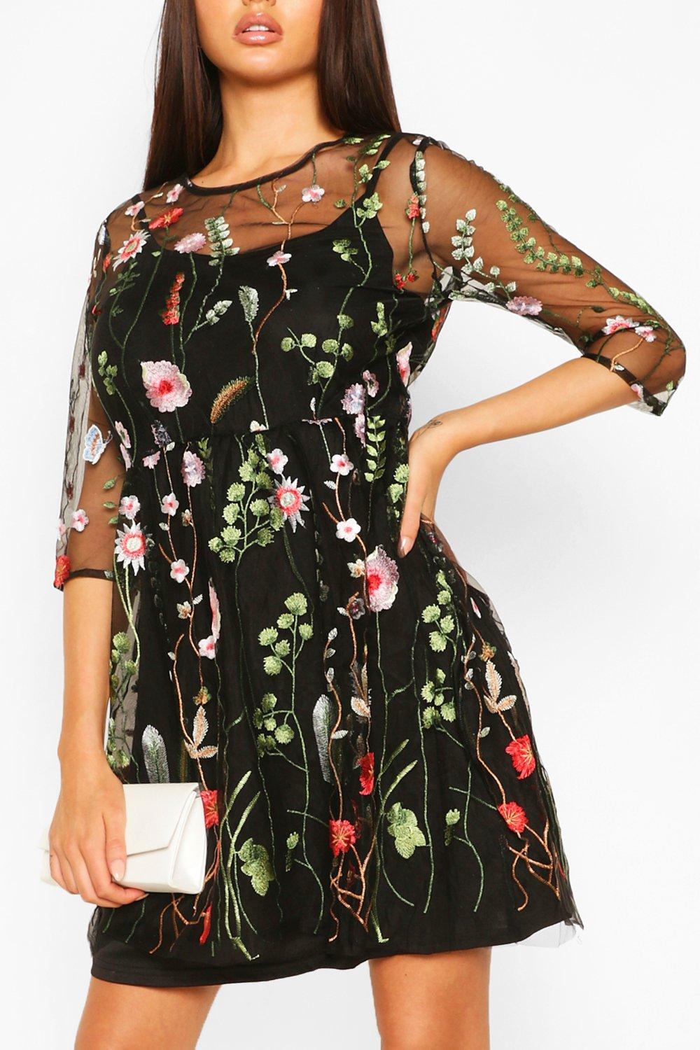 black dress with floral overlay