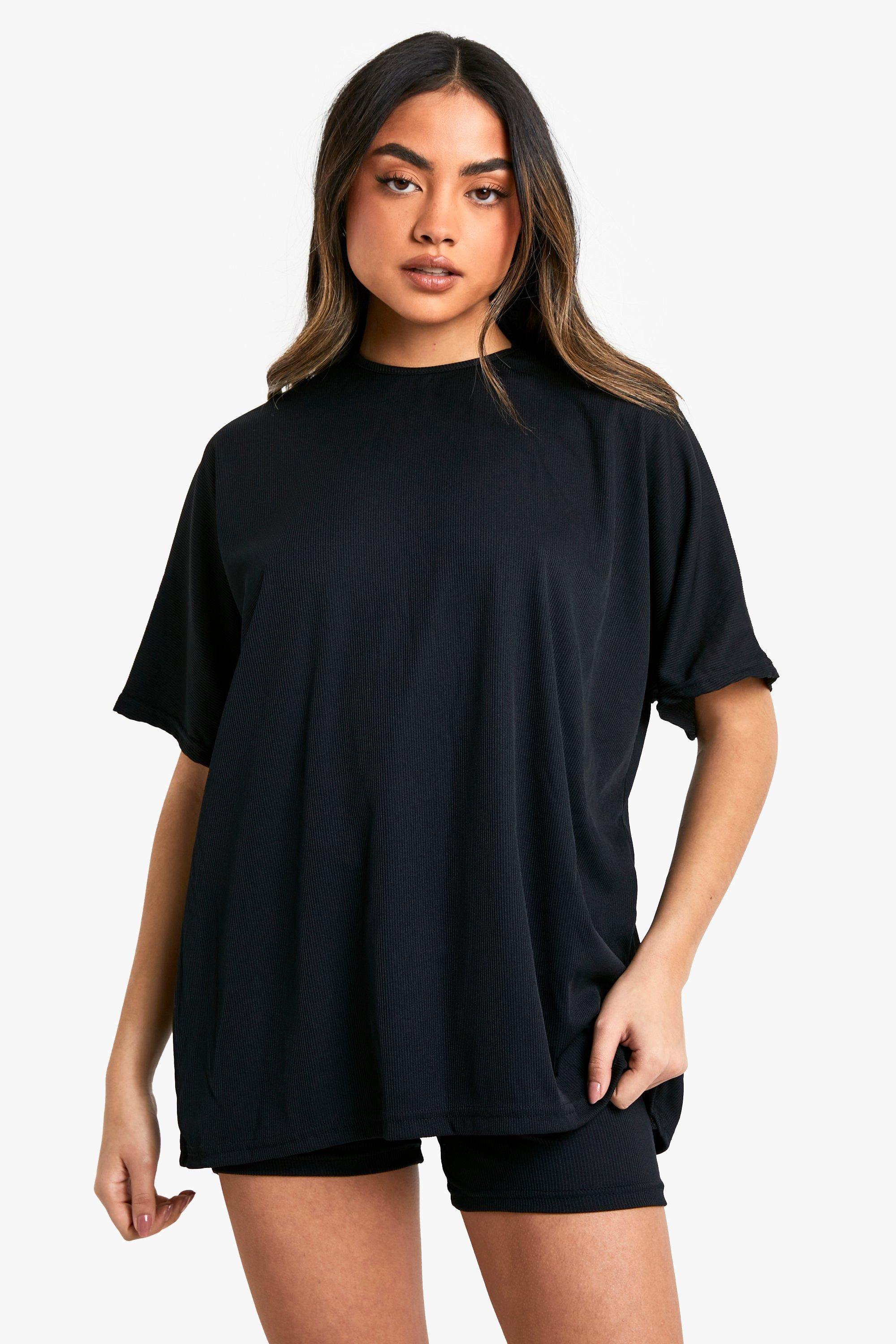 Cycling shorts and oversized black tee-shirt - Cinelle Paris, fashion for  women.