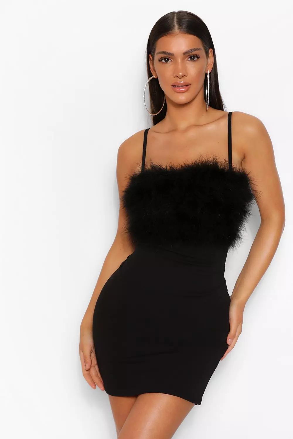 Black dress shop with fluffy trim