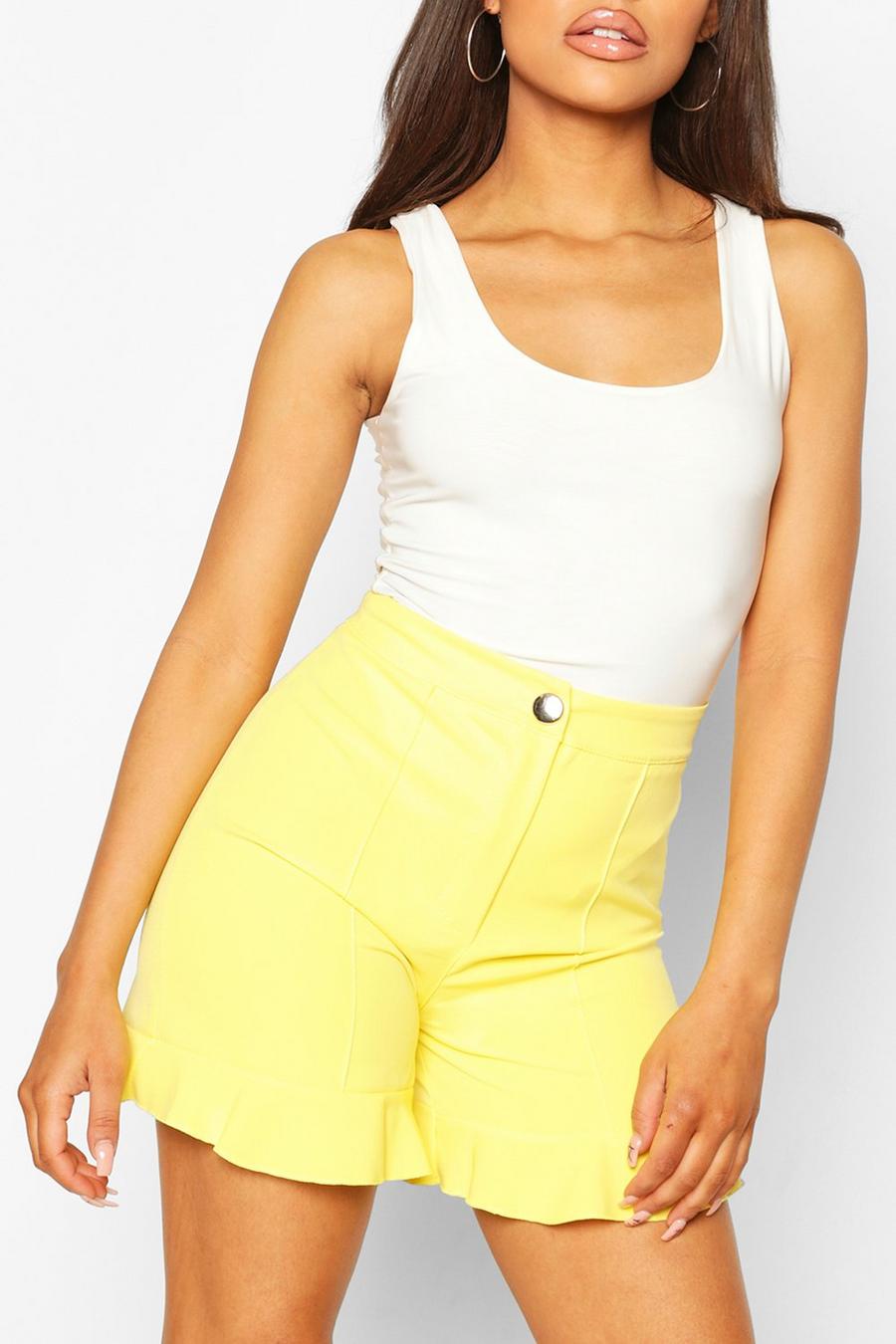 Eng anliegende Shorts mit Rüschensaum, Gelb image number 1