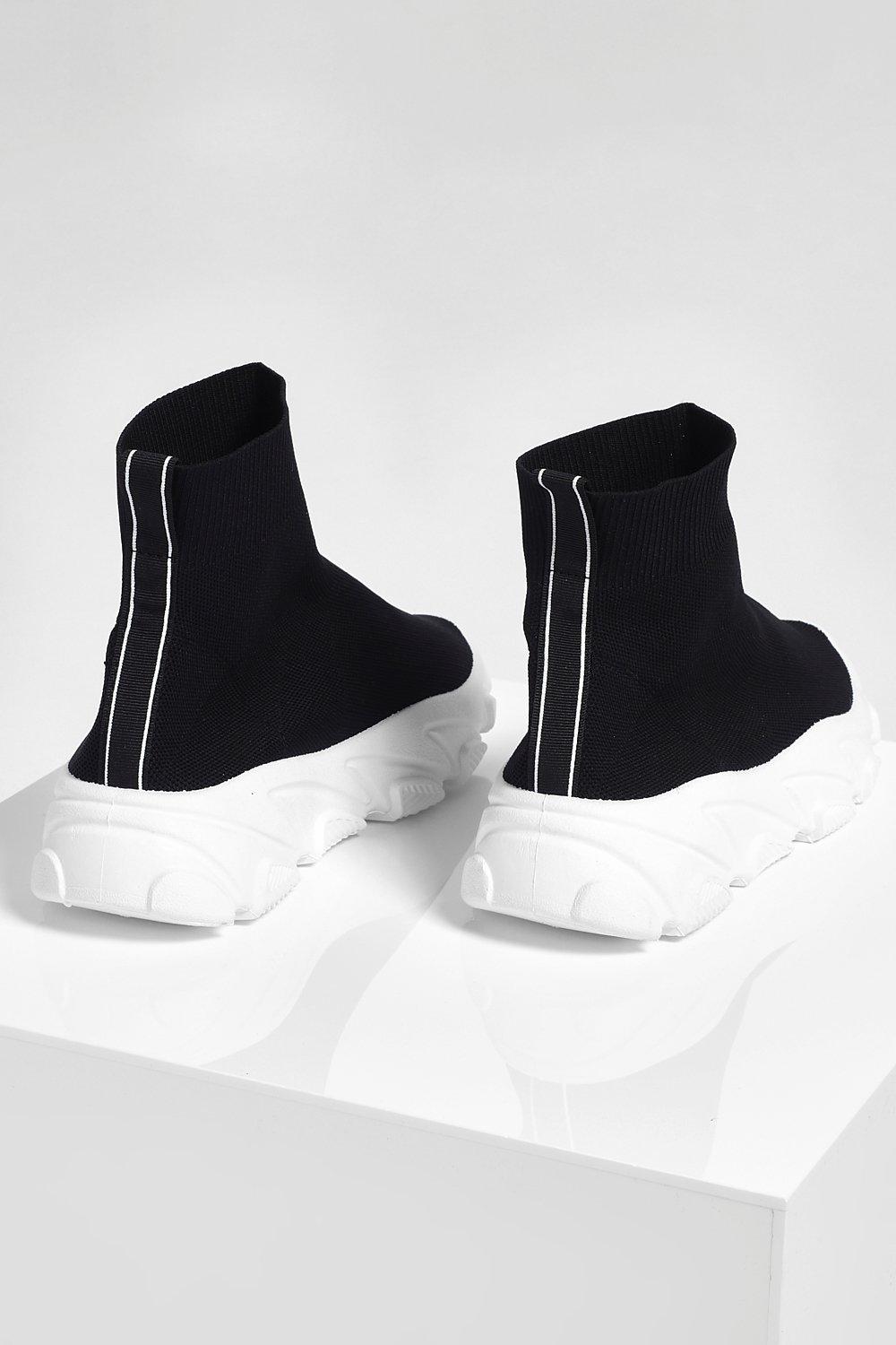 black sole sock trainers