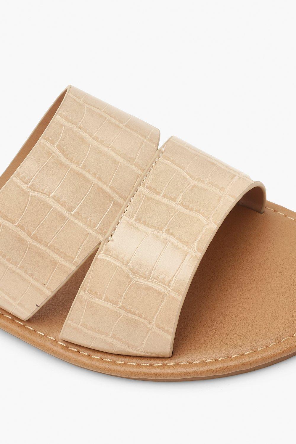 Peep store toe sliders