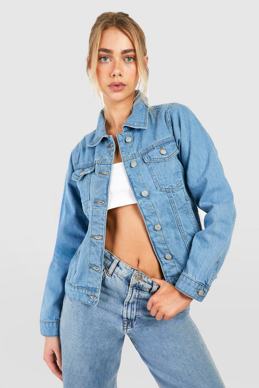 Premium Photo  Stylish woman in denim jacket and pink skirt with
