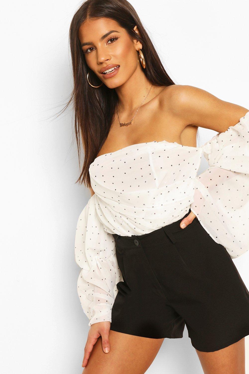 Black polka dot store off the shoulder top