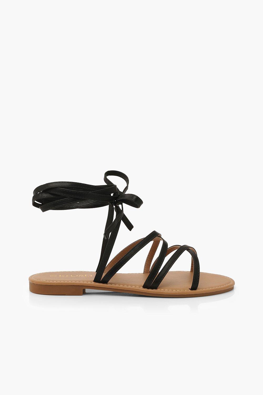 Strap up the hot sale leg flat sandals